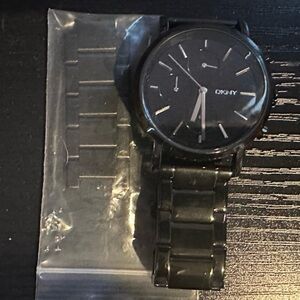 Women’s DKNY quartz watch, black ceramic, used